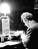 Australian reporter James Aldridge writing up a story in the Hotel Kämp in December 1939