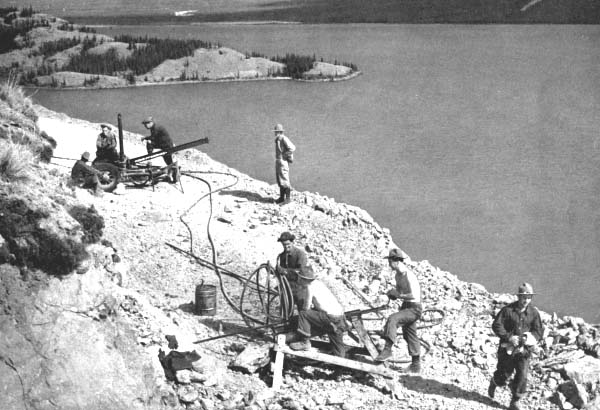 Building the highway up the side of a small lake as the Norwegian border was neared