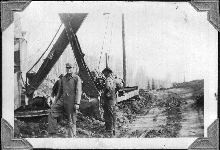 Crane Shovel putting in a Culvert