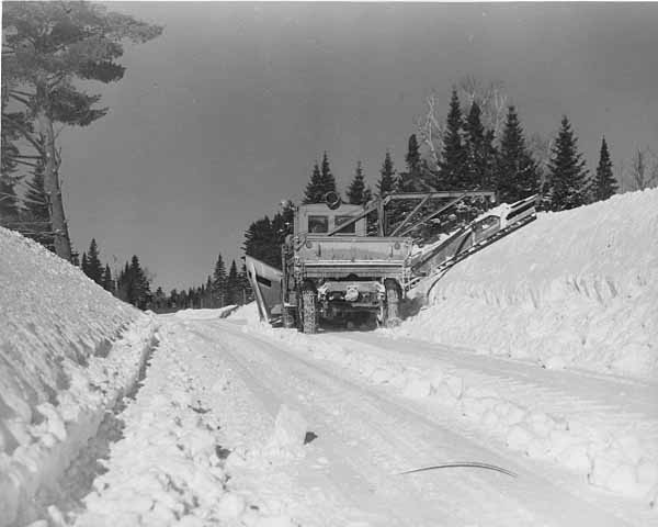 December 1939: Wedge and wing plow clearing the road.
