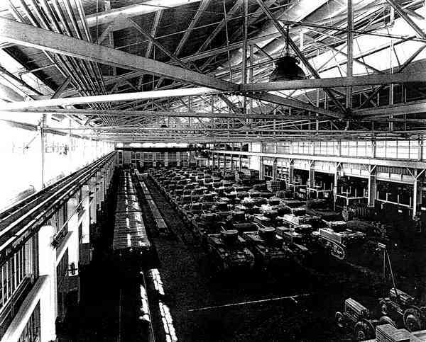 Warehouse facilities at Lyngenfjord later in WW2. American equipment is begining to arrive....''